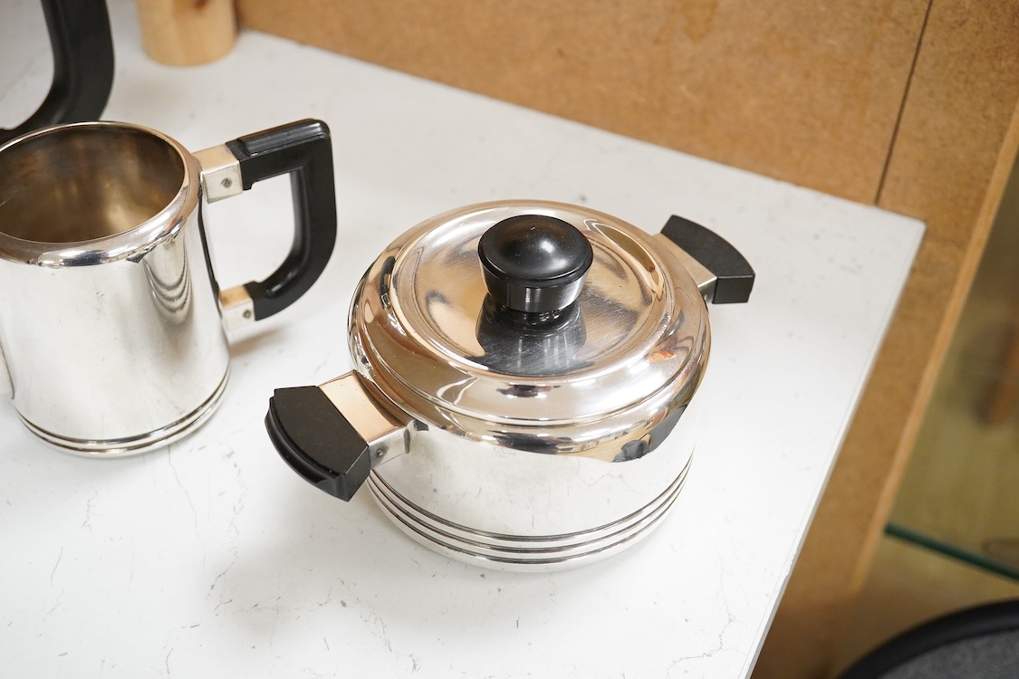 An Art Deco Christofle Gallia four piece silver plated tea set, largest 20cm wide